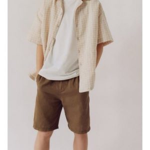 Chemise sans manches à carreaux en coton bio Chemise sans manches à carreaux en coton bio