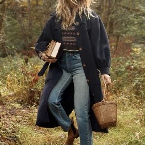 Manteau long en laine bouclée Manteau long en laine bouclée